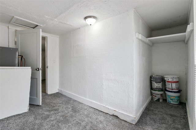 interior space featuring refrigerator and carpet floors