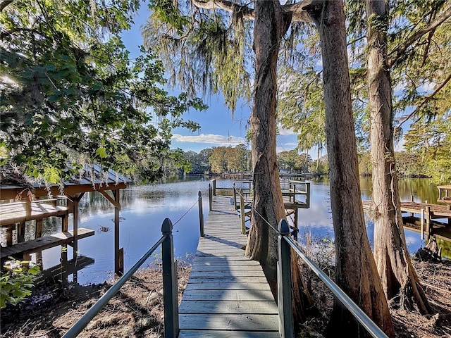 view of dock with a water view