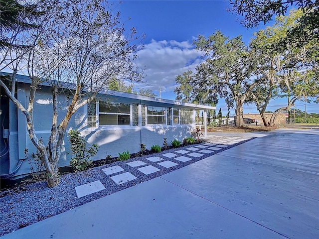 view of front of house with a patio