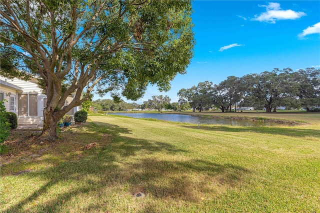 view of yard with a water view