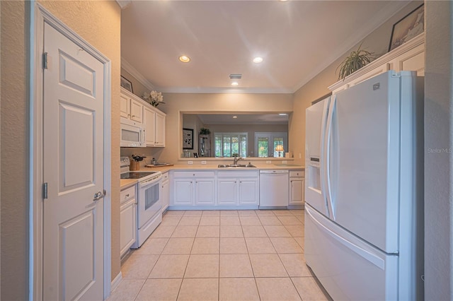 kitchen with crown molding, light tile patterned floors, light countertops, a sink, and white appliances