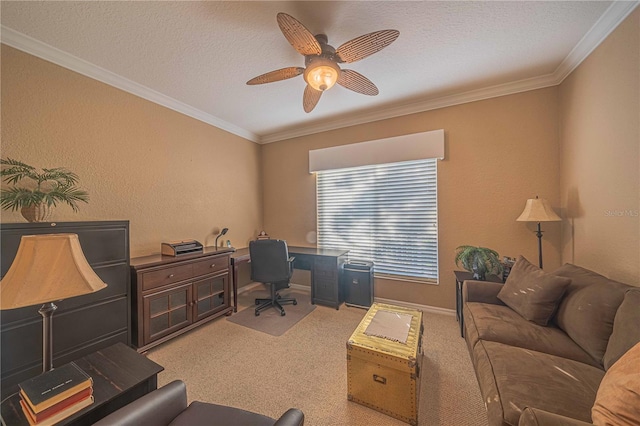 office space with carpet flooring, a textured ceiling, ceiling fan, and ornamental molding