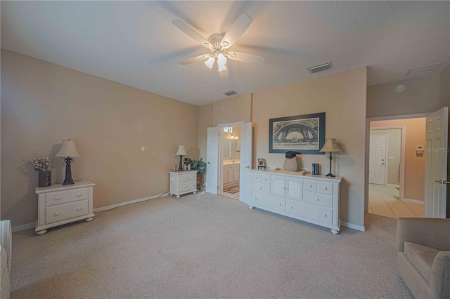 interior space featuring ceiling fan and light carpet