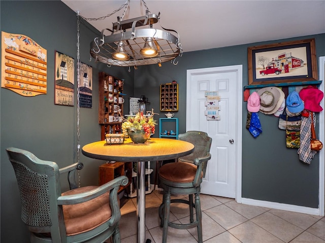 dining room with tile patterned flooring