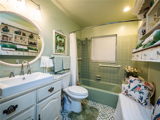 full bathroom with tile patterned flooring, vanity, shower / bath combination with curtain, and toilet