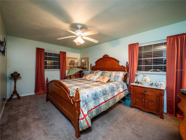 bedroom featuring ceiling fan and carpet