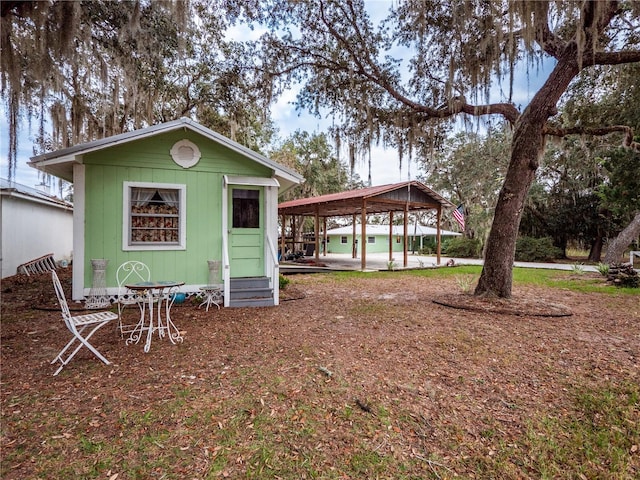 exterior space featuring a carport