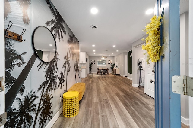 corridor featuring hardwood / wood-style floors