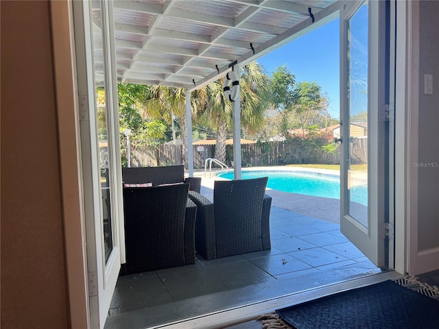 view of patio with a fenced in pool