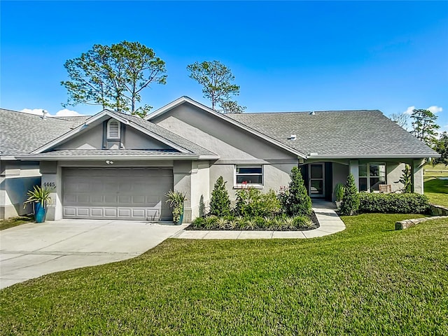 ranch-style home with a front lawn and a garage