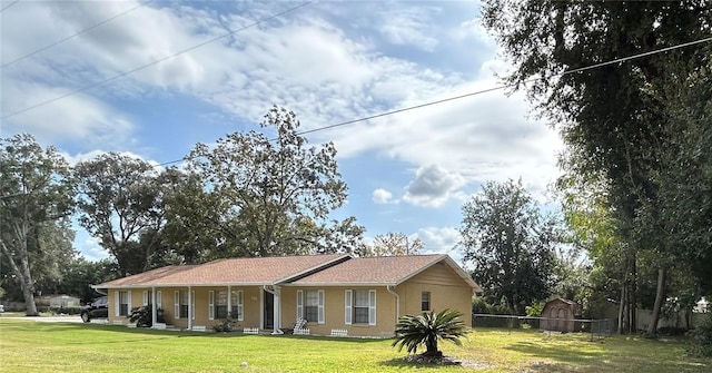 view of front of home with a front yard