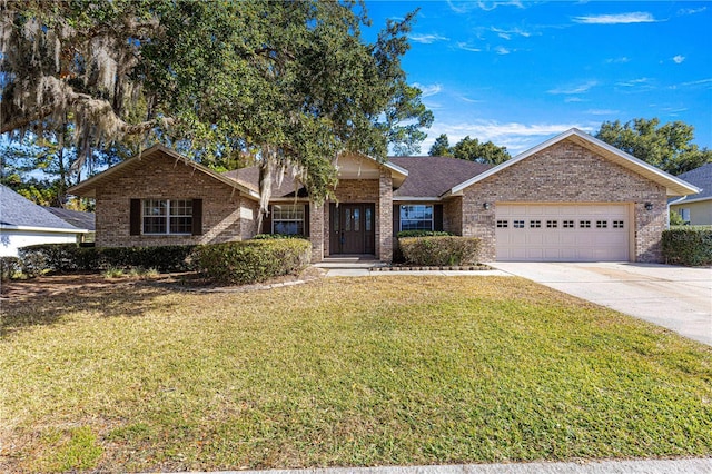 single story home with a garage and a front lawn