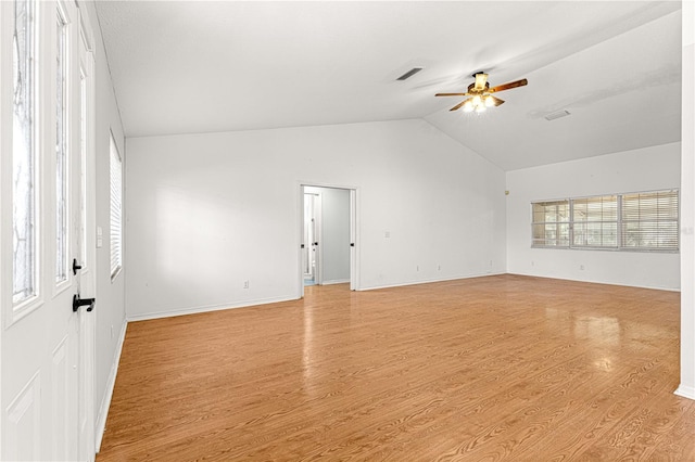 unfurnished room featuring ceiling fan, light wood-type flooring, and lofted ceiling