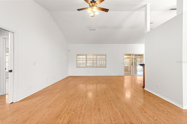 unfurnished living room with ceiling fan, high vaulted ceiling, and light hardwood / wood-style floors