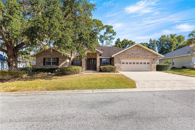 ranch-style home with a garage and a front lawn