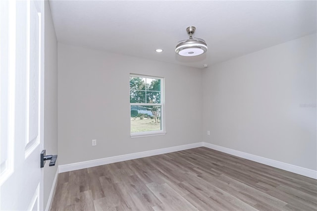 empty room featuring hardwood / wood-style floors