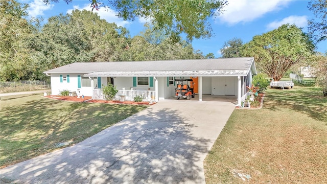 single story home with a porch, a carport, and a front lawn