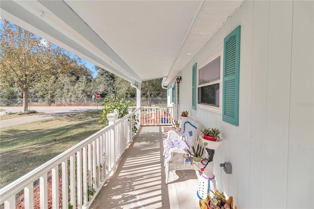 balcony featuring a porch