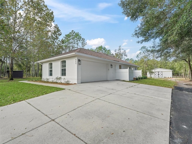 view of side of property with a yard