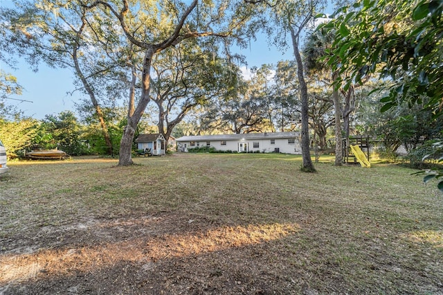 view of yard with a playground