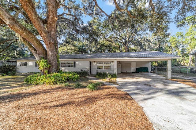 single story home with a carport