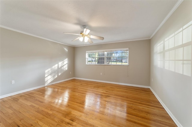 spare room with light hardwood / wood-style floors, ceiling fan, and crown molding