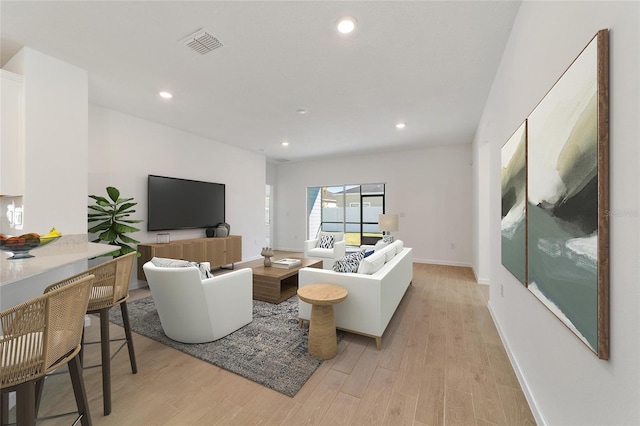 7930 SW 74th Loop, Ocala, FL 34481 - living area with light wood-style flooring, recessed lighting, and baseboards