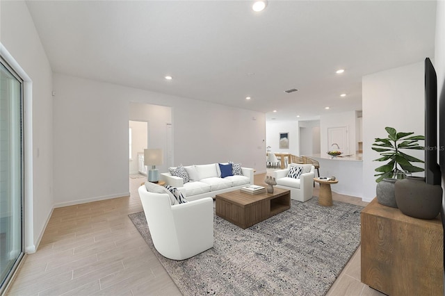 living room featuring light hardwood / wood-style floors