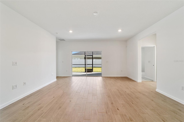 empty room featuring light hardwood / wood-style floors