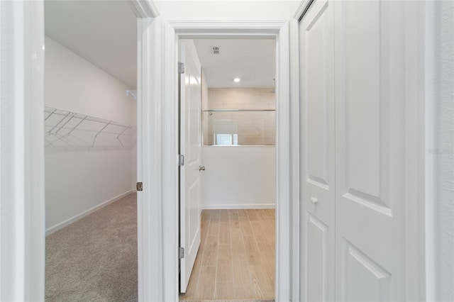 hallway featuring light wood-type flooring