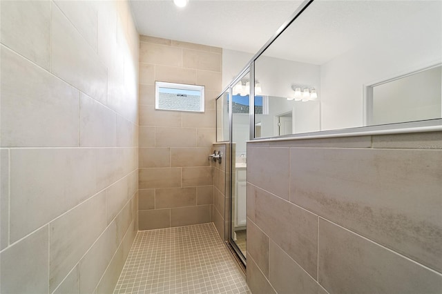 bathroom featuring tiled shower