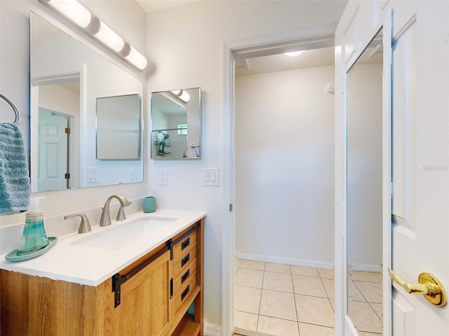 bathroom with vanity and tile patterned floors