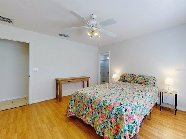 bedroom featuring light wood-type flooring and ceiling fan