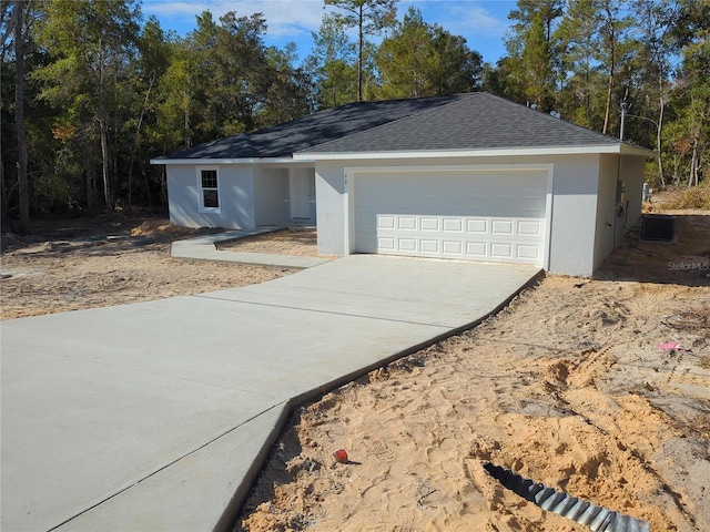 ranch-style home with a garage