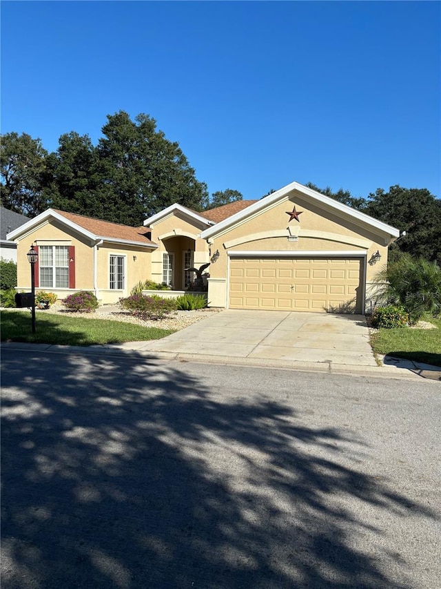 single story home featuring a garage