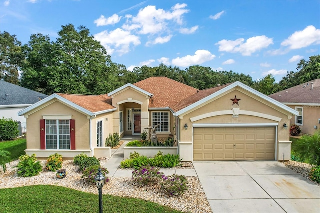 ranch-style home featuring a garage