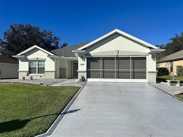 ranch-style home featuring a front yard and a garage