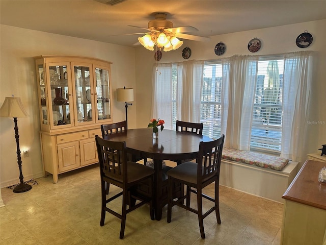 dining room with ceiling fan