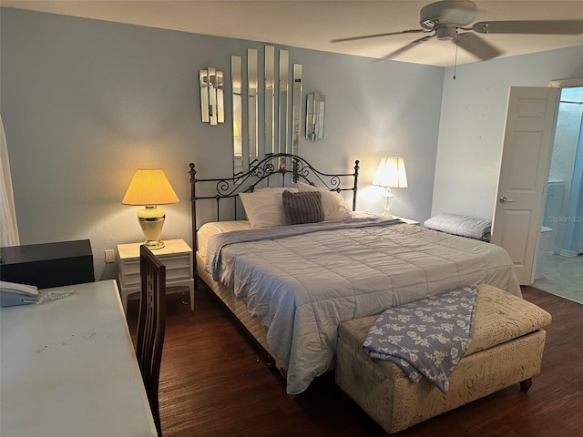 bedroom featuring ceiling fan, dark hardwood / wood-style flooring, and ensuite bathroom