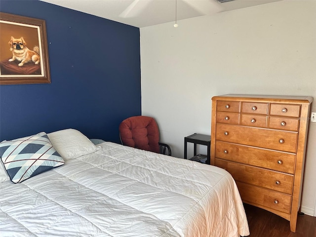 bedroom with hardwood / wood-style flooring and ceiling fan