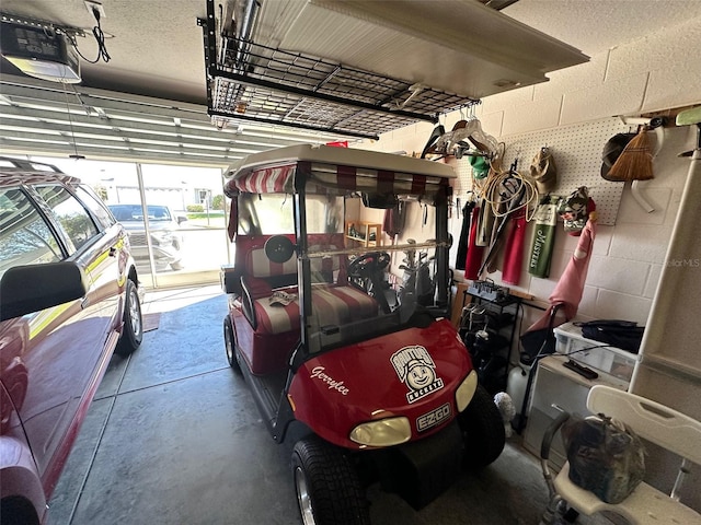 garage featuring a garage door opener