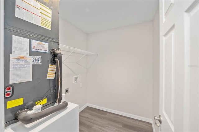 utility room with heating unit