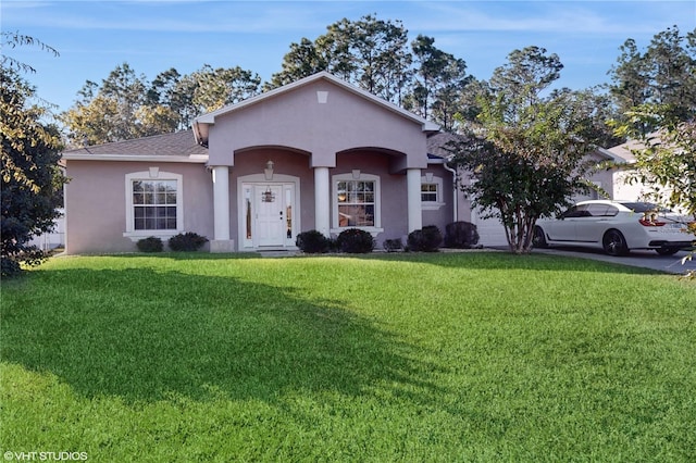 ranch-style home with a front lawn