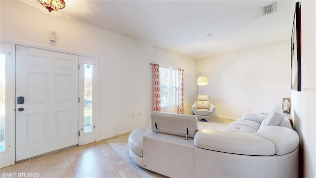 entryway featuring light tile patterned flooring