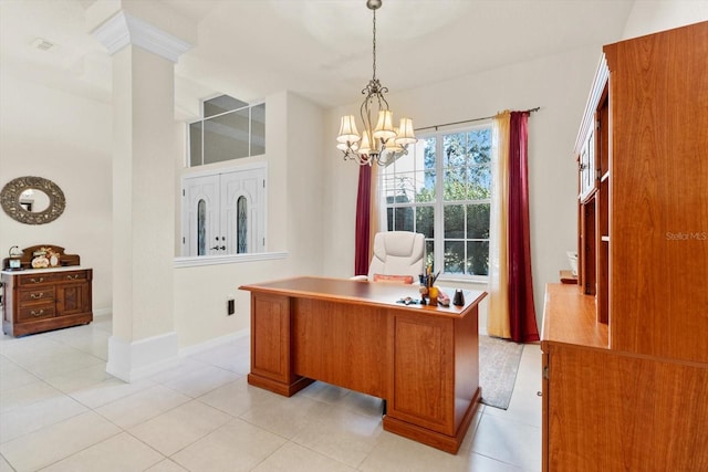 tiled home office featuring a chandelier