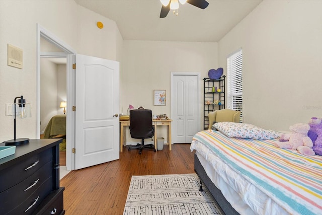 bedroom featuring wood-type flooring, a closet, and ceiling fan