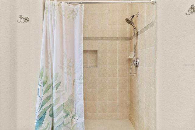 bathroom with curtained shower