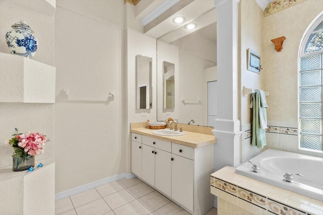 bathroom with vanity, tiled bath, and tile patterned floors