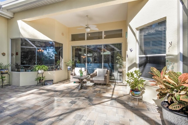 view of patio featuring ceiling fan