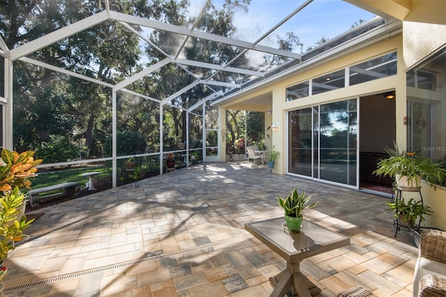 view of patio / terrace with glass enclosure